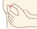 乳頭を摘んで、分泌液が出ないかをチェックしているイラスト
